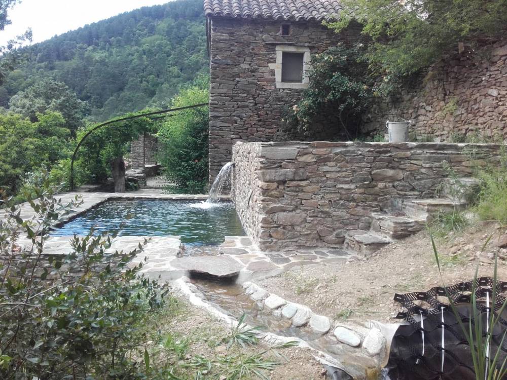Piscine naturelle sur des faîsses - Piscine Naturelle du Bruel